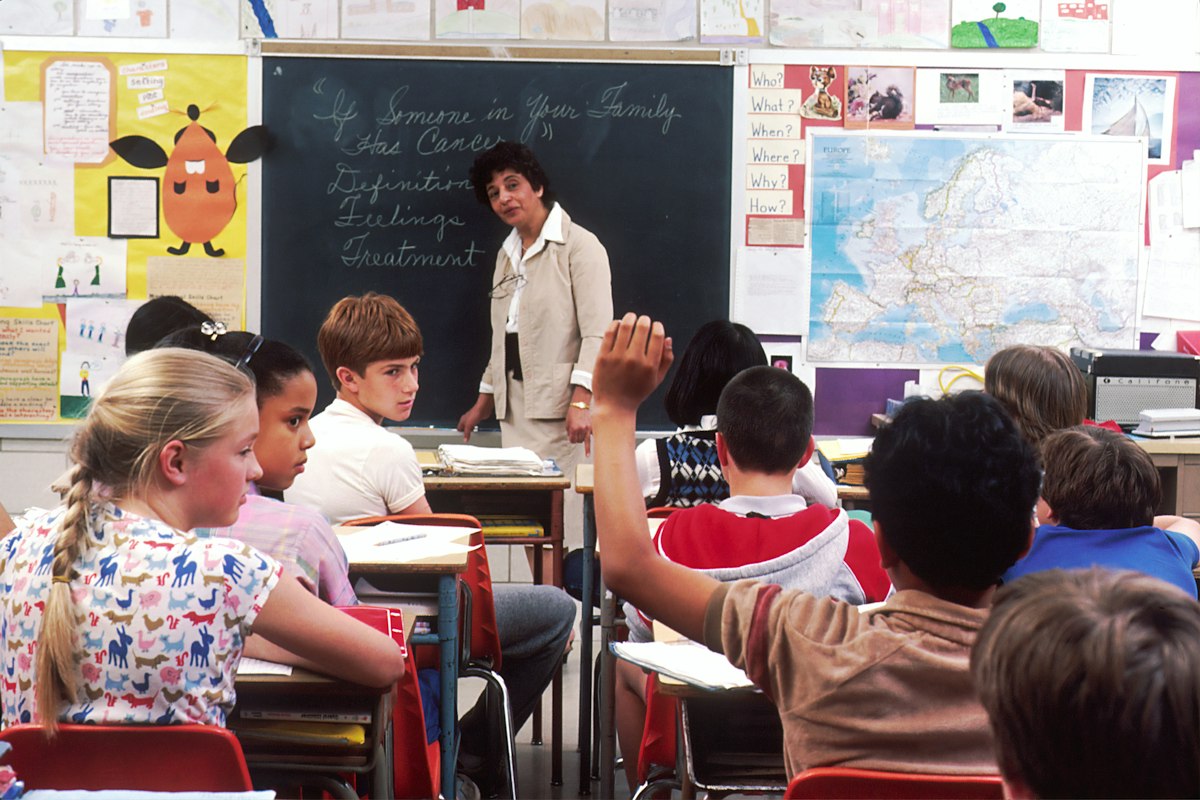 Children learning kindness in classroom